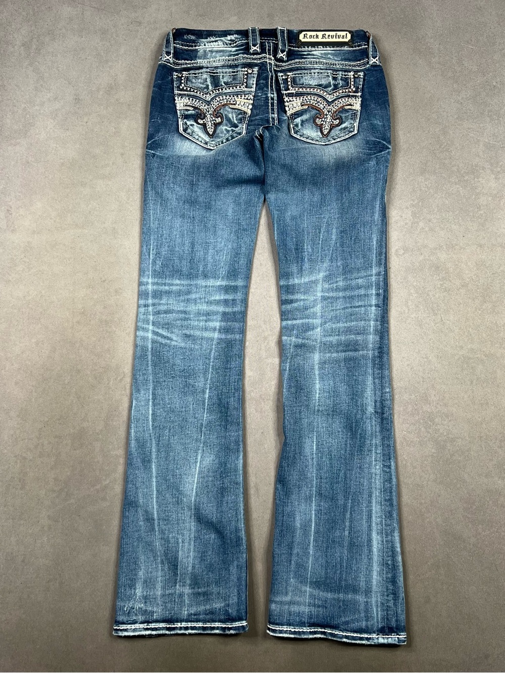 Rock Revival Distressed Medium Blue Flare Jeans with Embellished Pockets